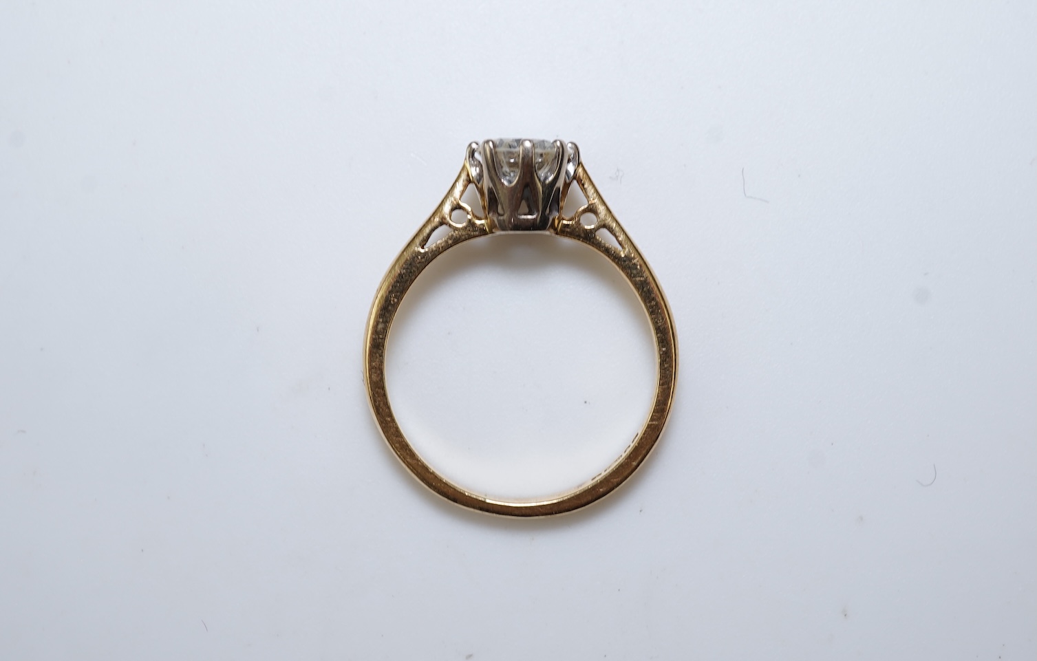 A diamond solitaire ring